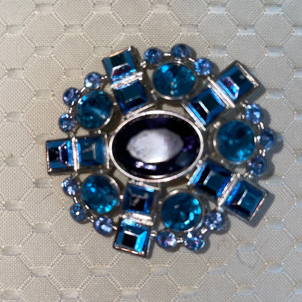 Blue stone brooch